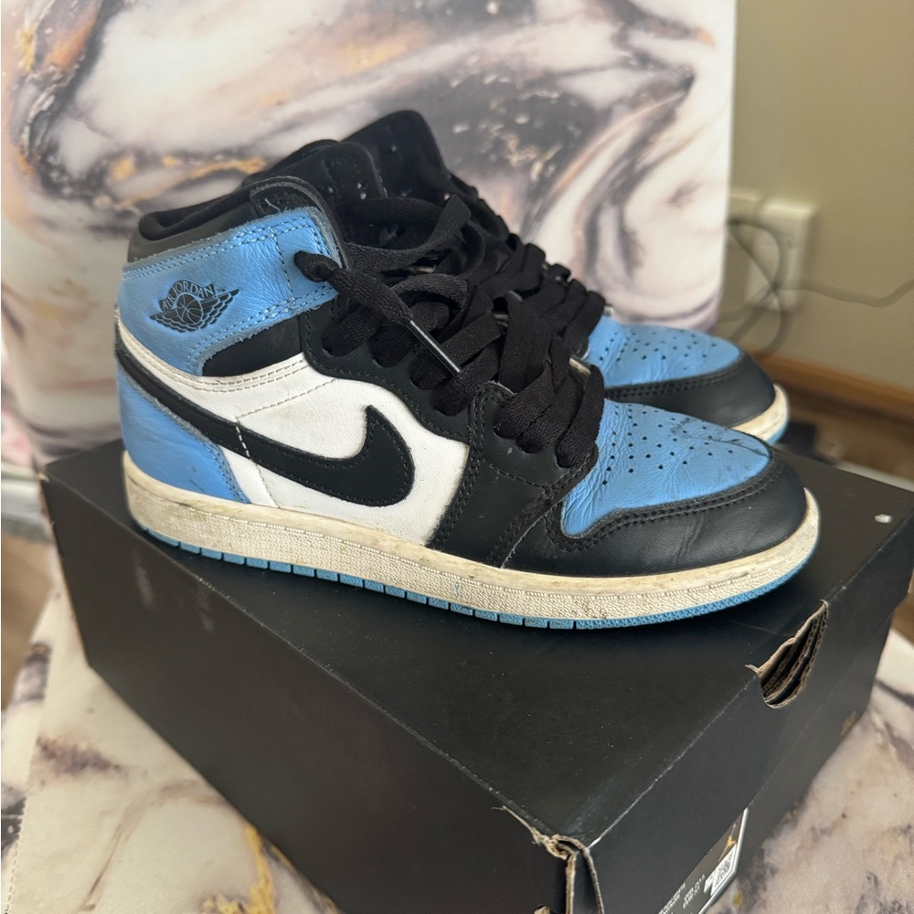Nike Air Jordan 1 High OG in Black, White, and Blue